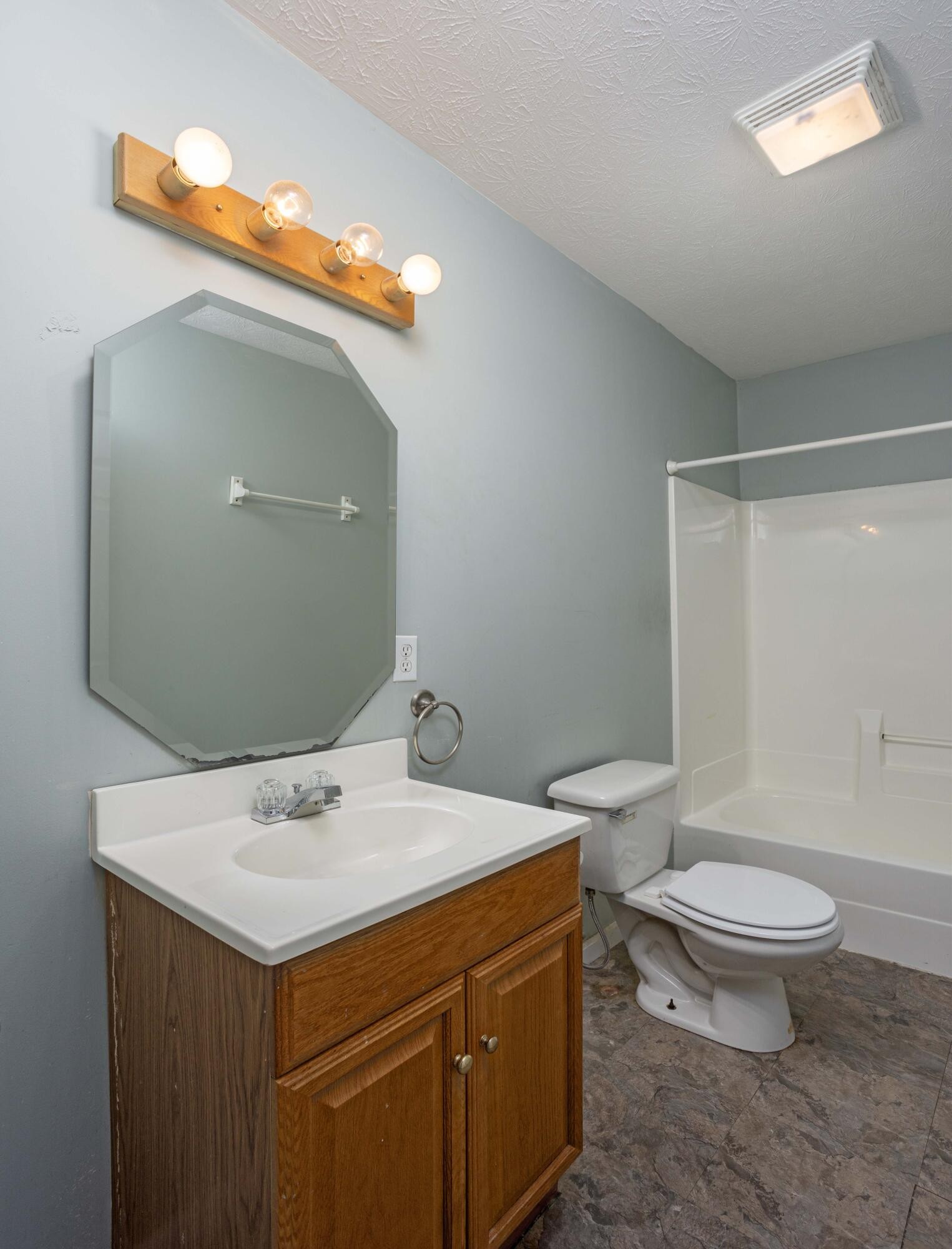 1165 Possum Trot Road Grandview, TN 37337 - Photo 34 of 48 a bathroom with a sink and a mirror