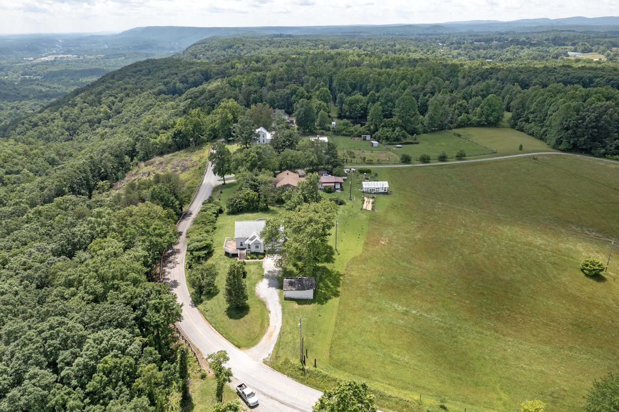 1165 Possum Trot Road Grandview, TN 37337 - Photo 39 of 48 a view of a lake with a mountain
