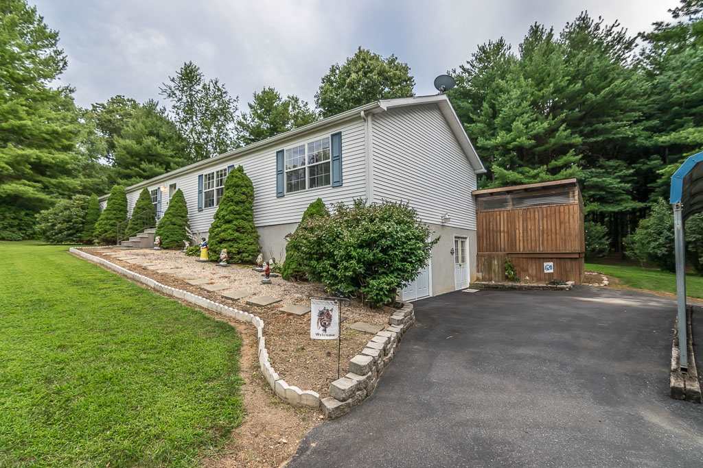 325 Steeles Fort Road Raphine, VA 24472 - Photo 12 of 50 a view of a house with backyard and a garden