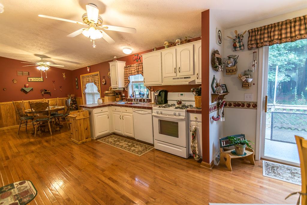 325 Steeles Fort Road Raphine, VA 24472 - Photo 25 of 50 a kitchen with cabinets and chairs