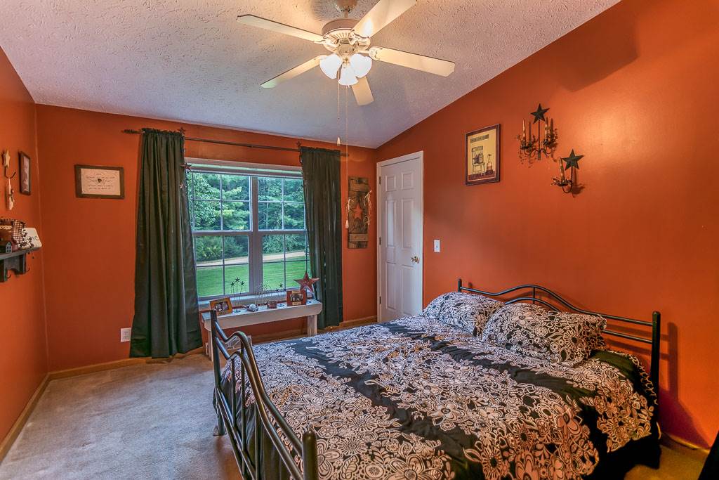 325 Steeles Fort Road Raphine, VA 24472 - Photo 41 of 50 a bedroom with a bed and a window