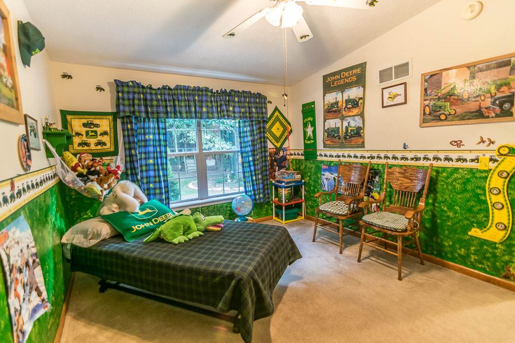 325 Steeles Fort Road Raphine, VA 24472 - Photo 45 of 50 a bedroom with furniture and a large window