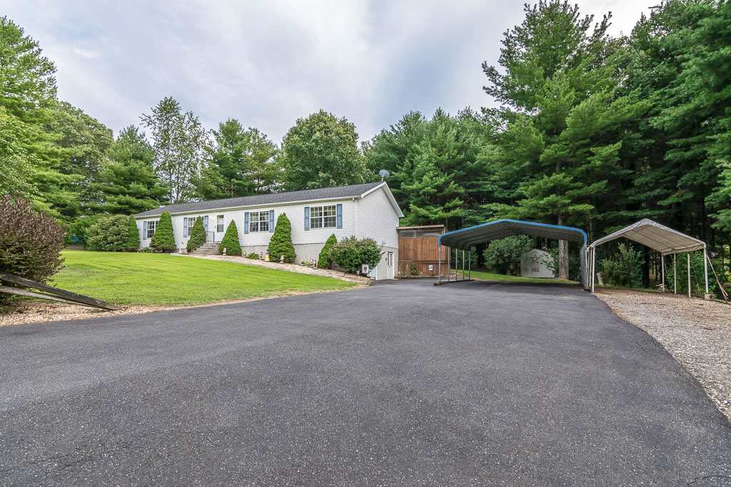 325 Steeles Fort Road Raphine, VA 24472 - Photo 7 of 50 a view of a house with a yard and large trees