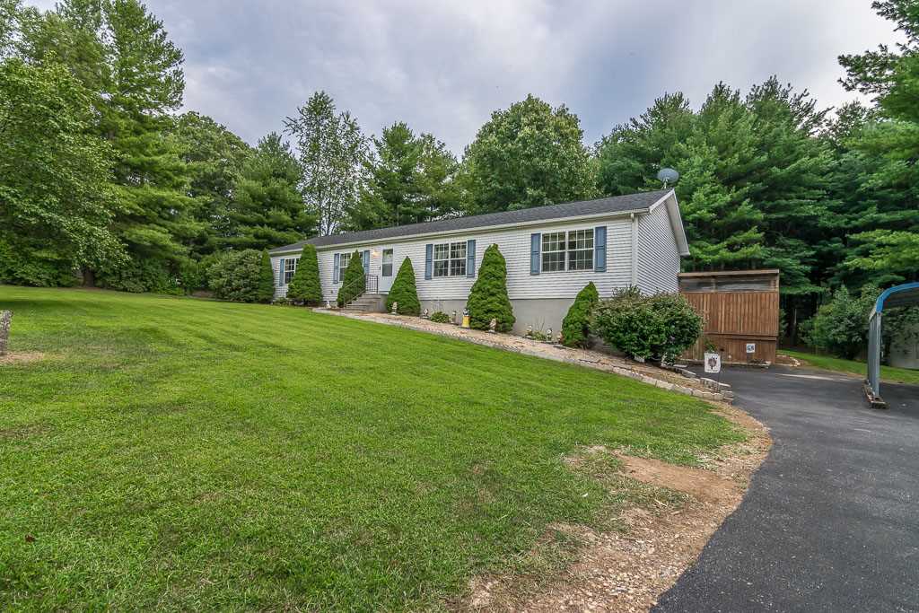 325 Steeles Fort Road Raphine, VA 24472 - Photo 8 of 50 a front view of a house with garden