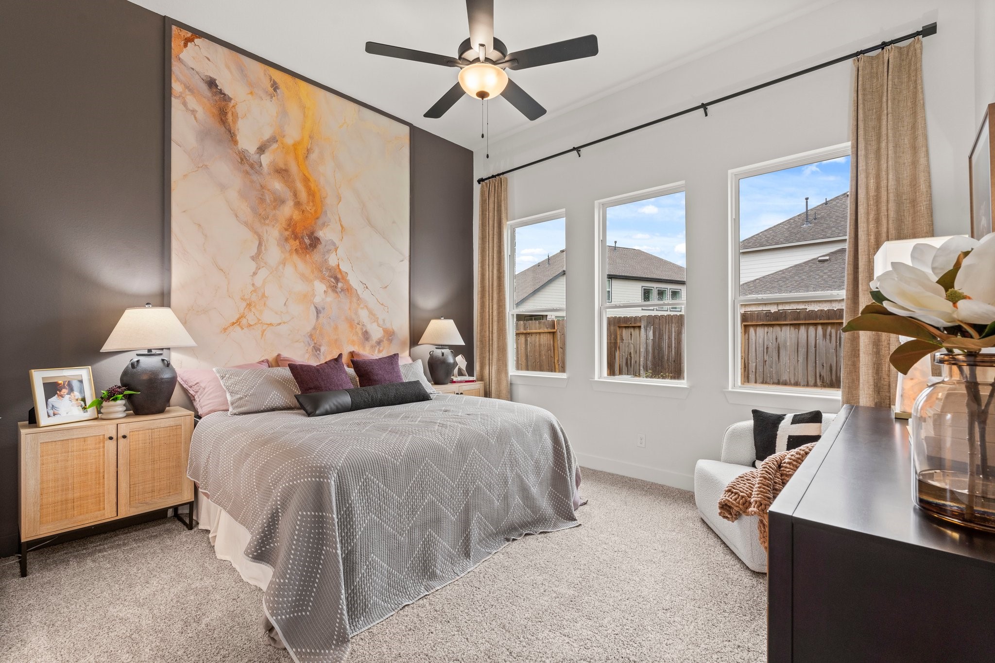 30951 Breezy Way Fulshear, TX 77423 - Photo 12 of 41 a bedroom with double bed and a window