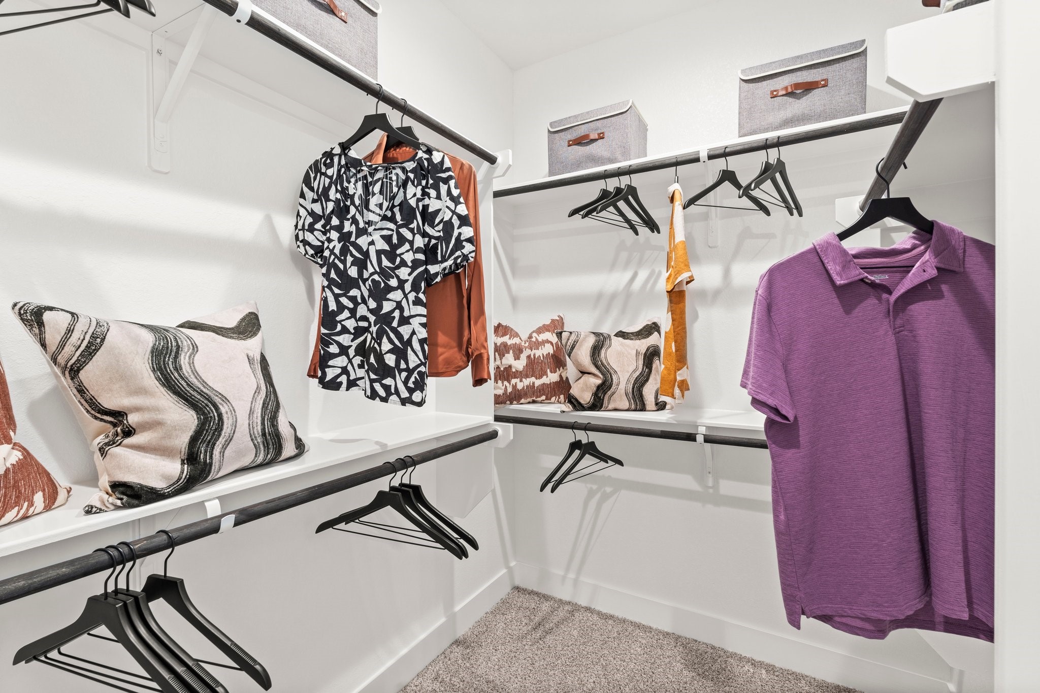 30951 Breezy Way Fulshear, TX 77423 - Photo 16 of 41 a view of walk in closet with clothes and shoes