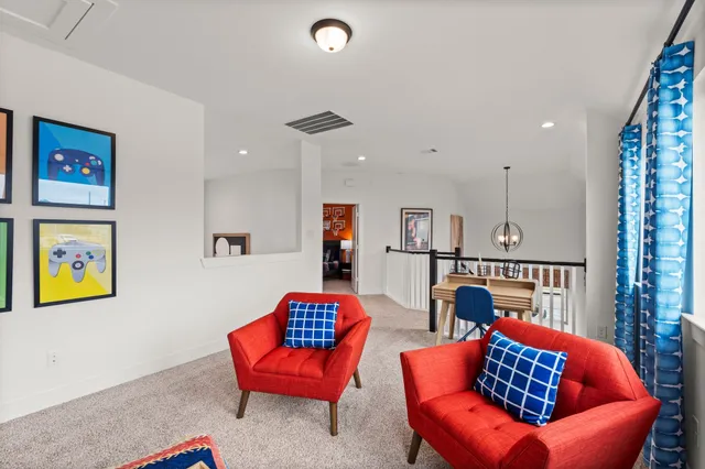 a living room with furniture a rug and a couch