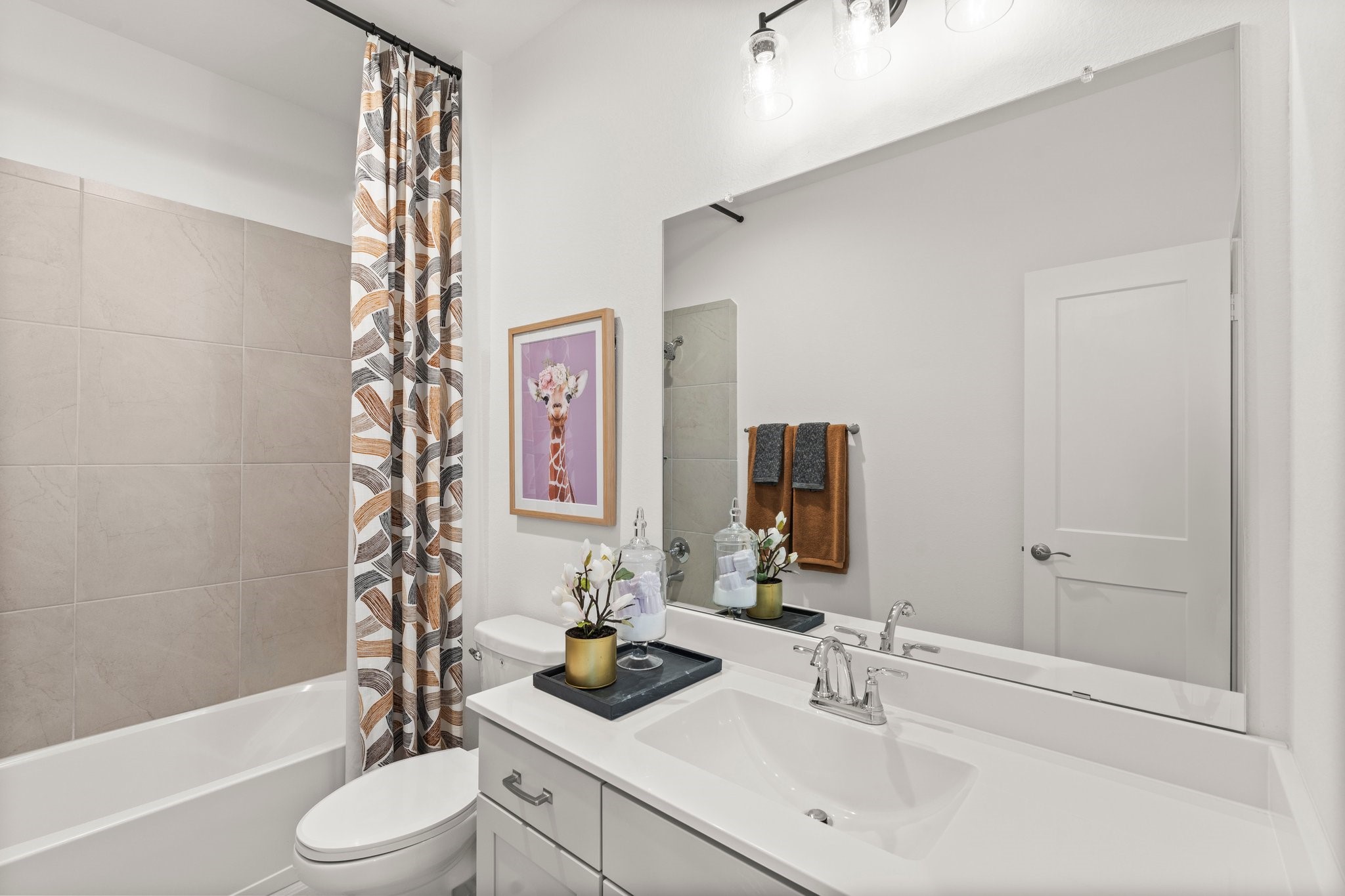 30951 Breezy Way Fulshear, TX 77423 - Photo 23 of 41 a bathroom with a sink toilet and shower