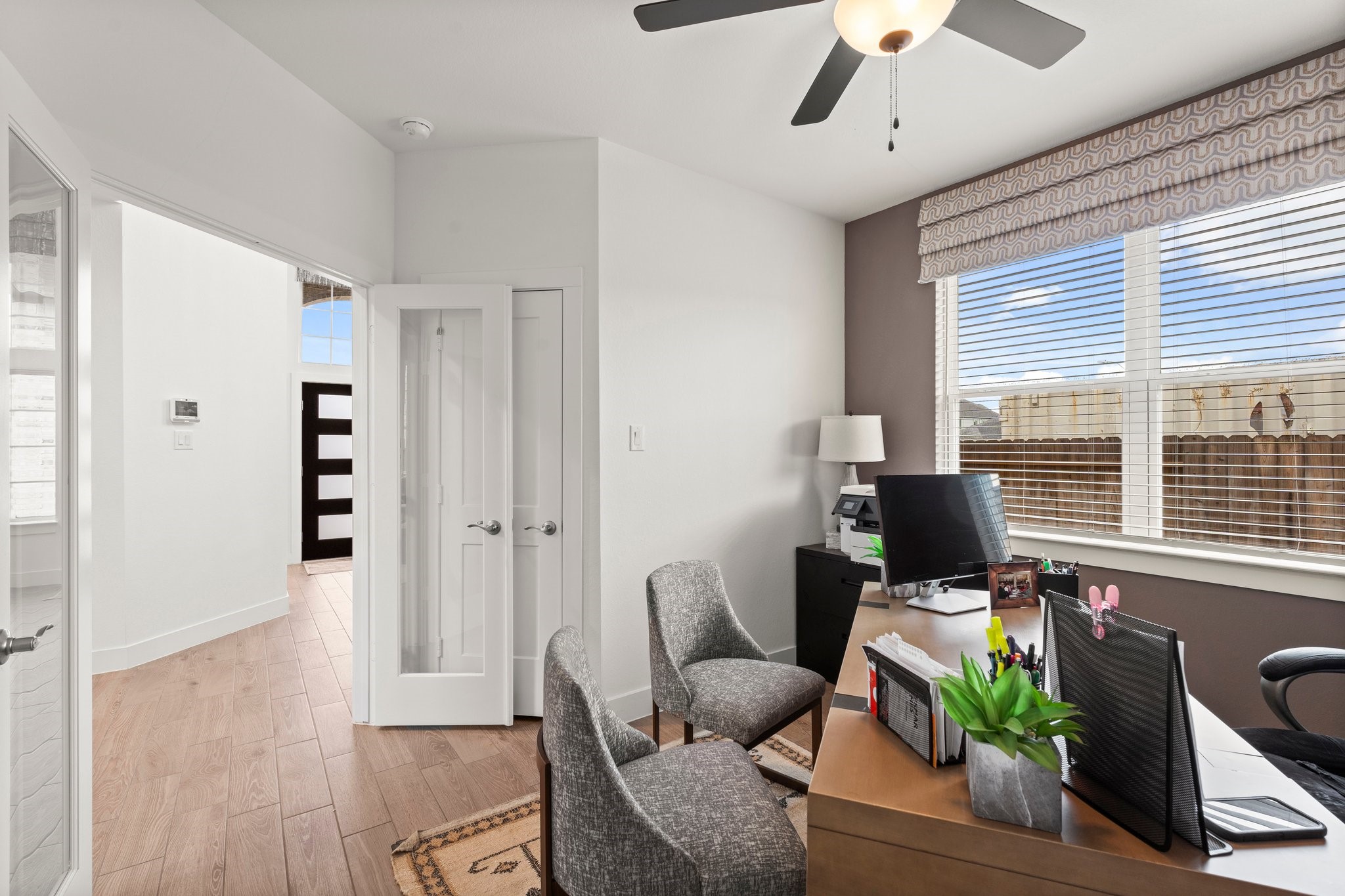 30951 Breezy Way Fulshear, TX 77423 - Photo 27 of 41 a workspace with furniture and a window