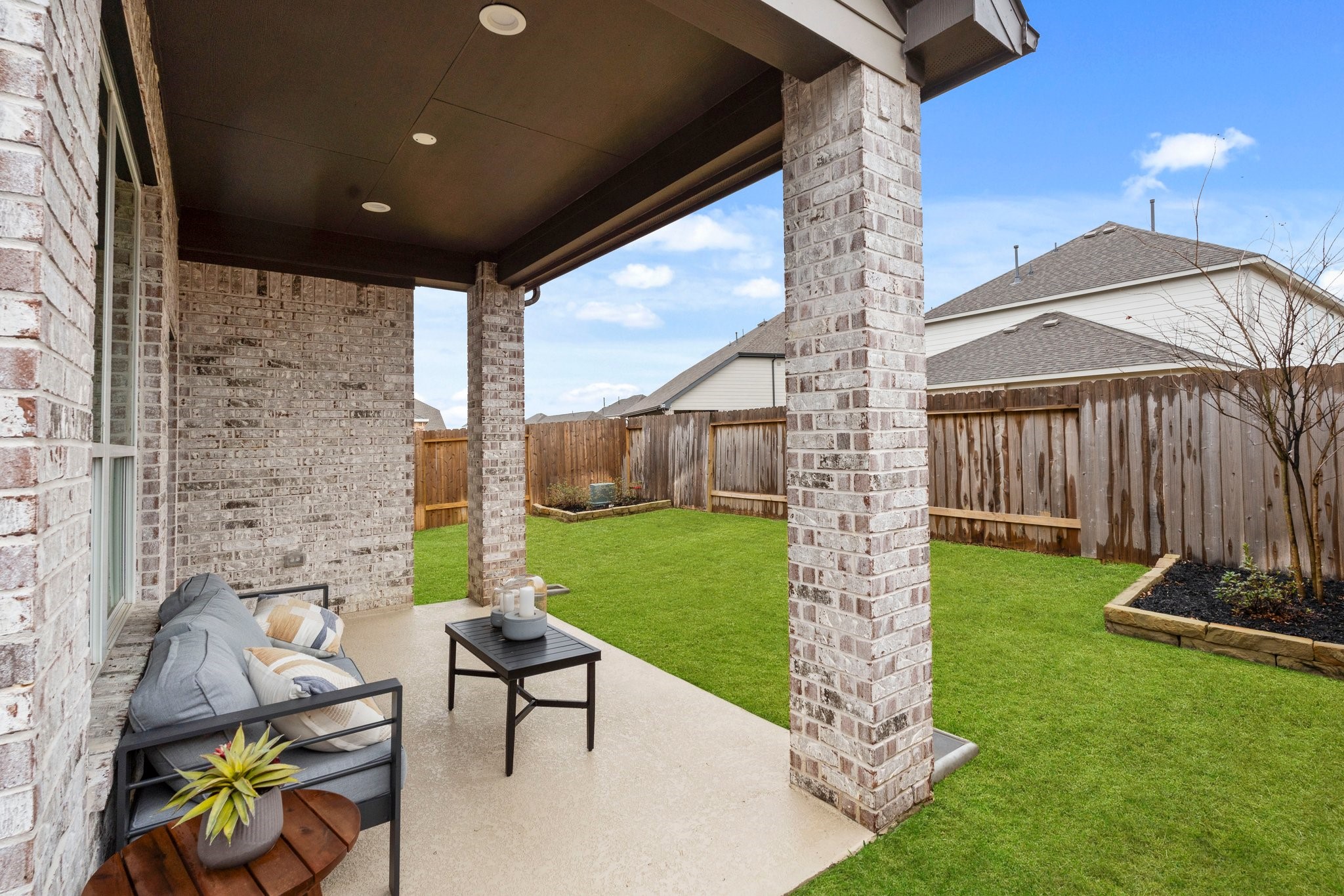 30951 Breezy Way Fulshear, TX 77423 - Photo 28 of 41 a garden view with a seating space
