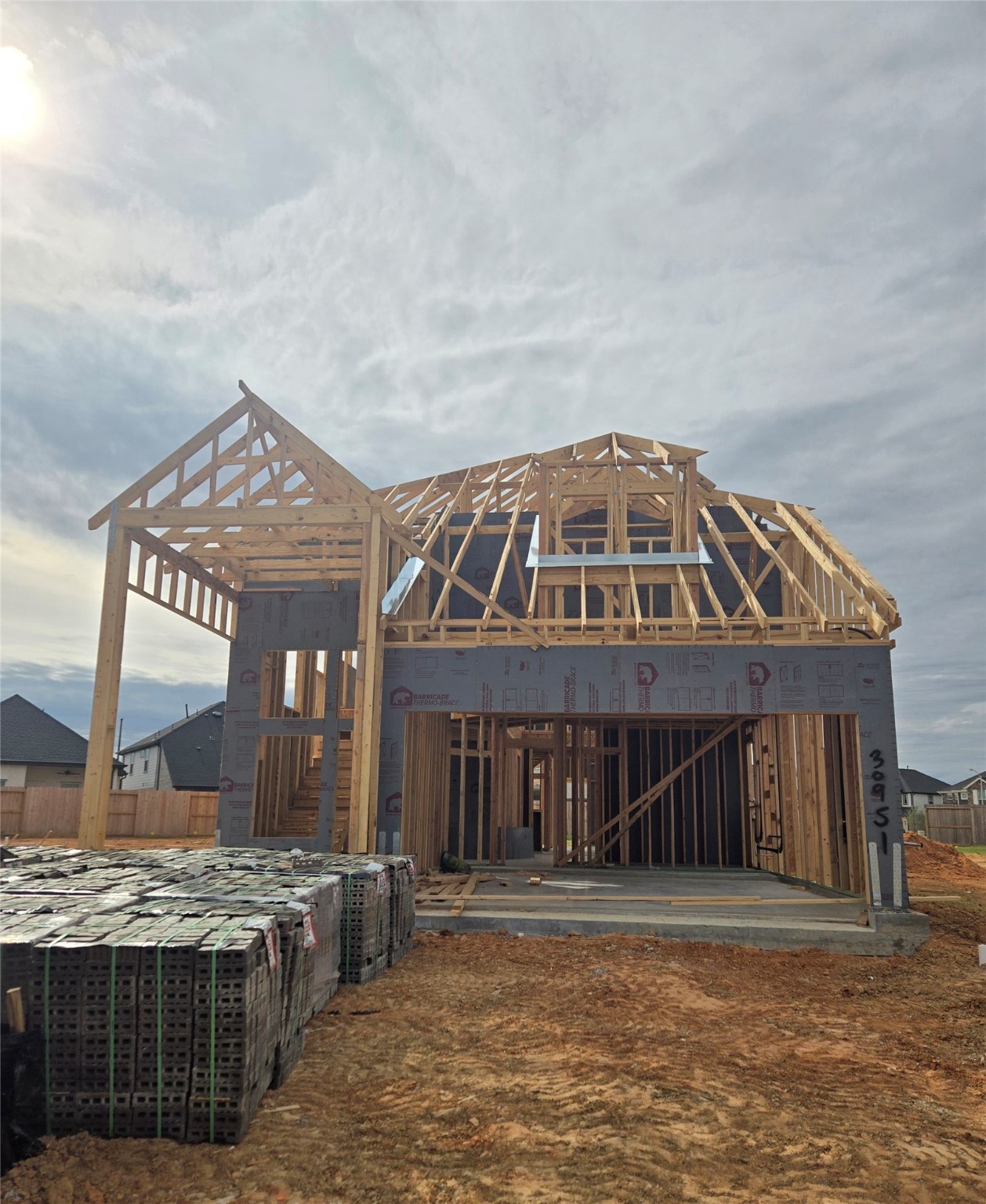 30951 Breezy Way Fulshear, TX 77423 - Photo 31 of 41 a front view of a house with a yard