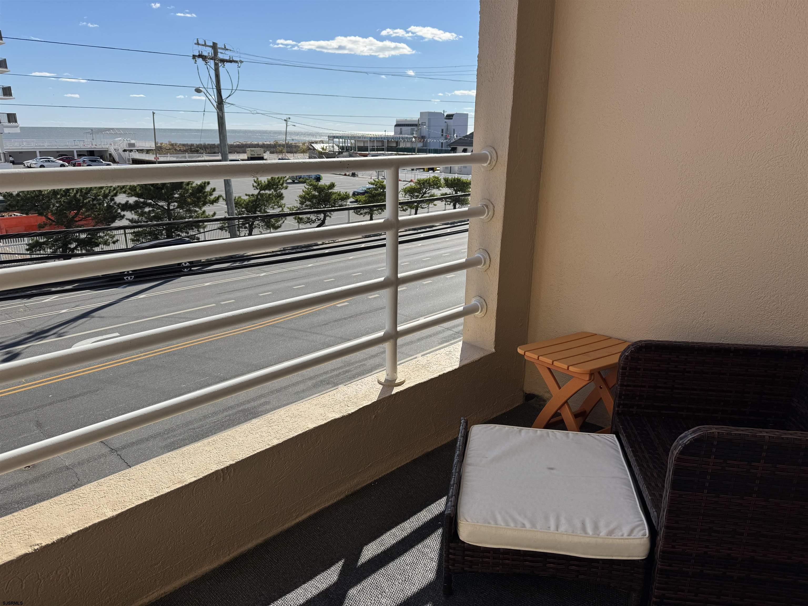 9101 Atlantic Avenue, Unit 202 Margate City, NJ 08402 - Photo 3 of 26 a kitchen with a table and chairs