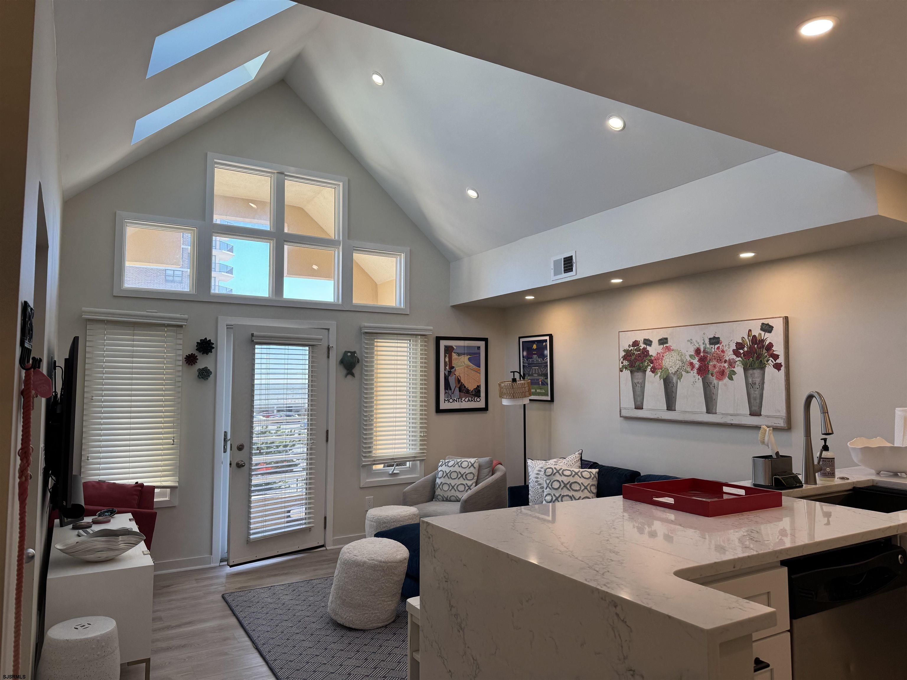 9101 Atlantic Avenue, Unit 202 Margate City, NJ 08402 - Photo 10 of 26 a bedroom with furniture and a air conditioner vent