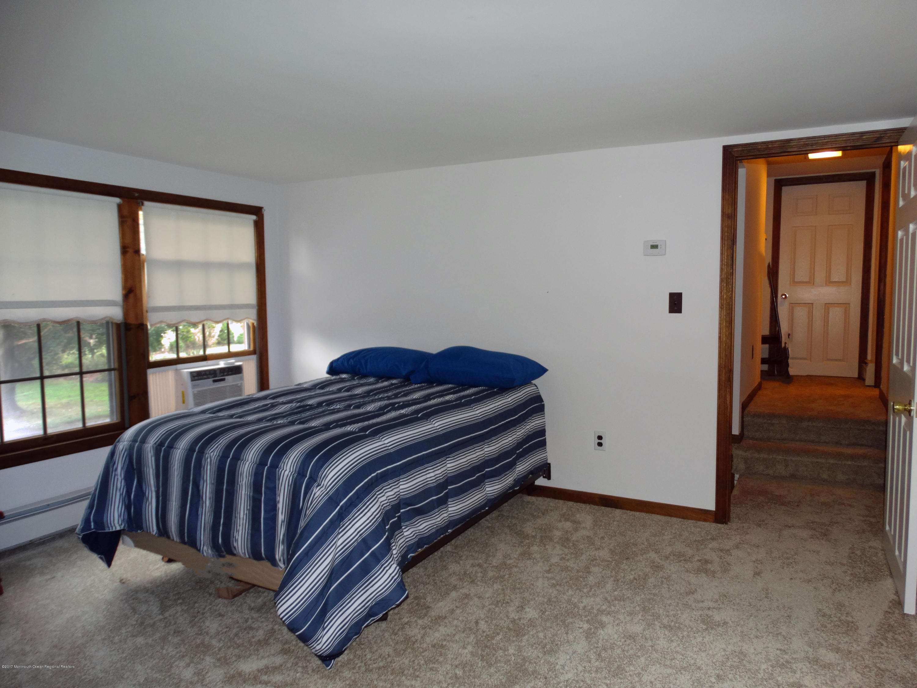 850 Adelphia Road Freehold, NJ 07728 - Photo 11 of 25 a bedroom with a bed and window