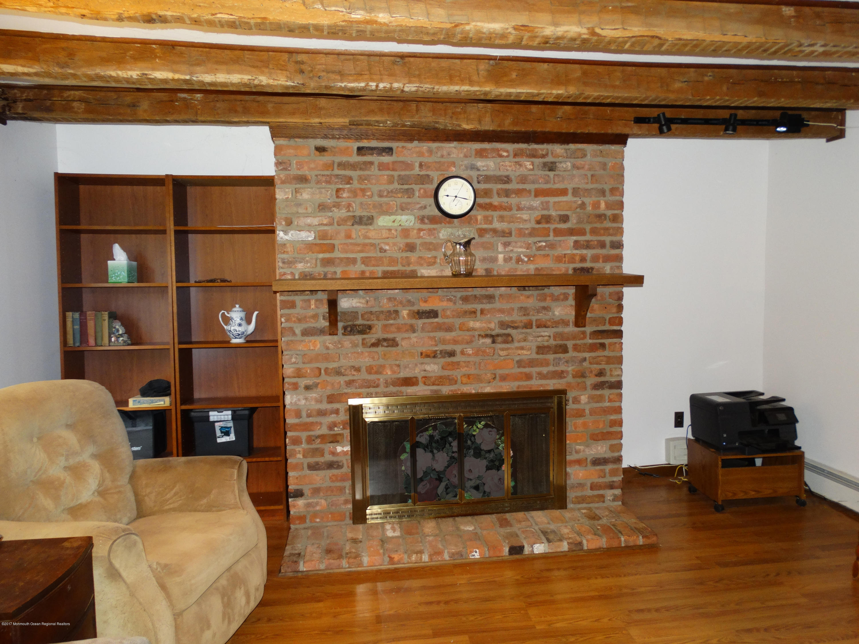 850 Adelphia Road Freehold, NJ 07728 - Photo 5 of 25 a living room with furniture and a fireplace