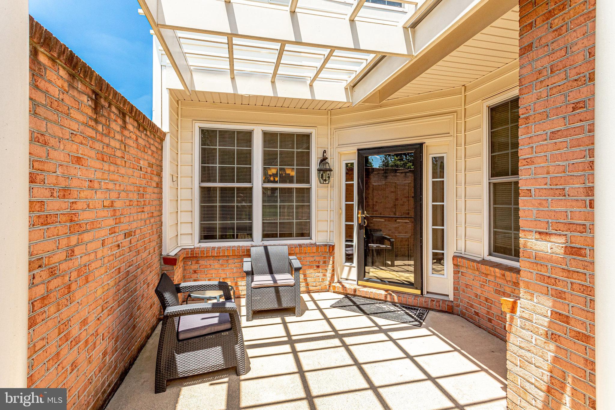 44320 McHenry Square Ashburn, VA 20147 - Photo 3 of 55 Private enclosed front patio