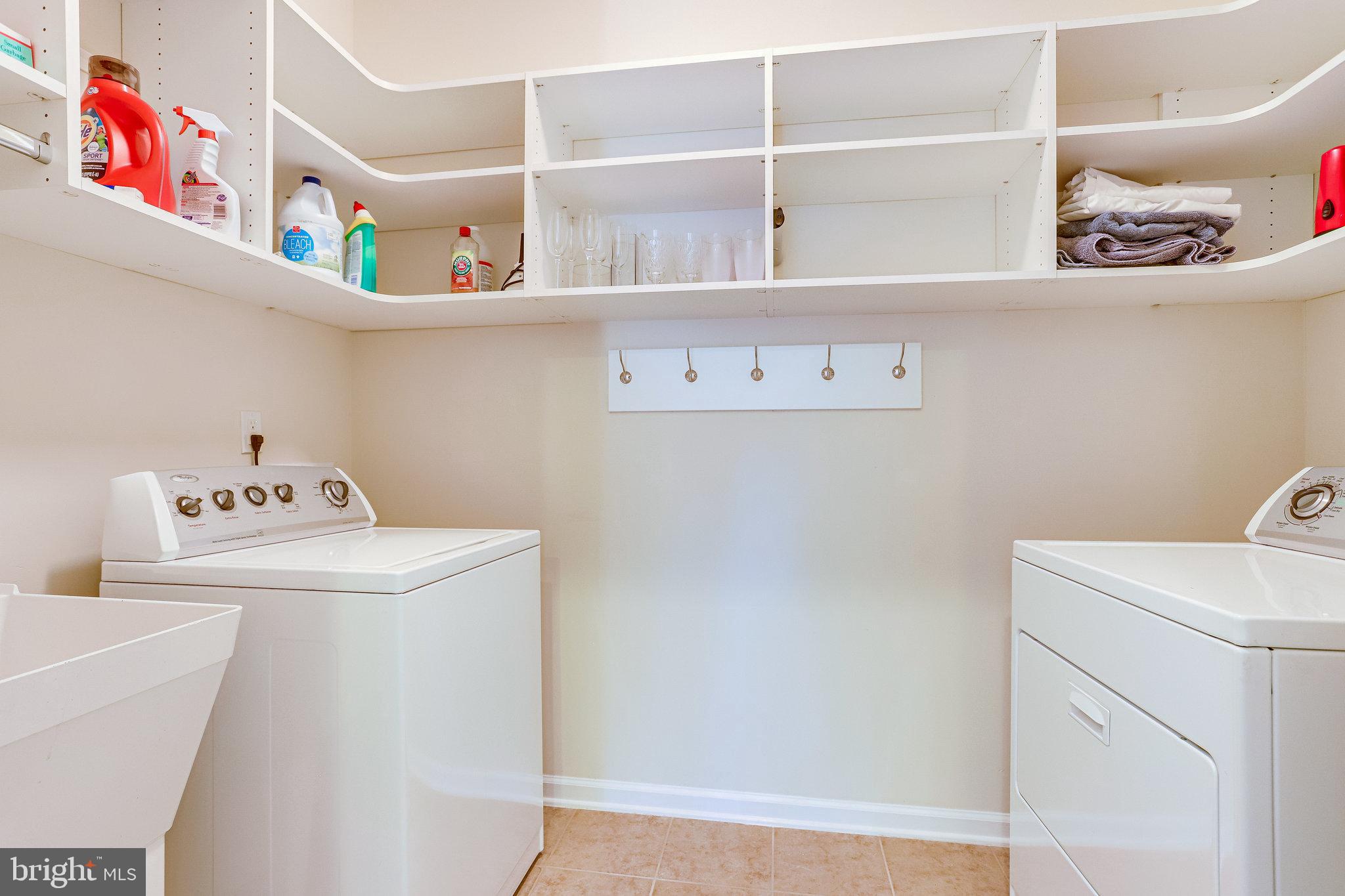 44320 McHenry Square Ashburn, VA 20147 - Photo 24 of 55 Huge laundry room with utility sink and built-ins