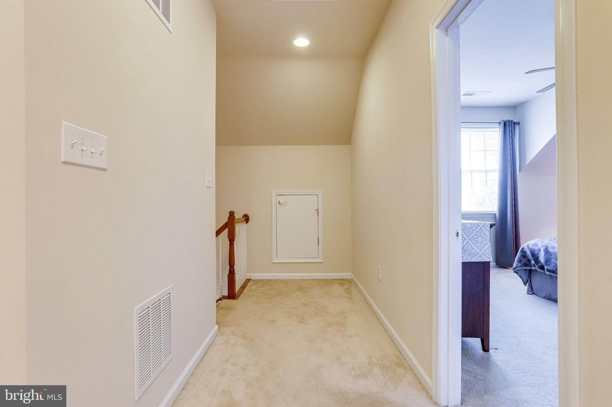 44320 McHenry Square Ashburn, VA 20147 - Photo 34 of 55 Upper level hall with door to cedar closet