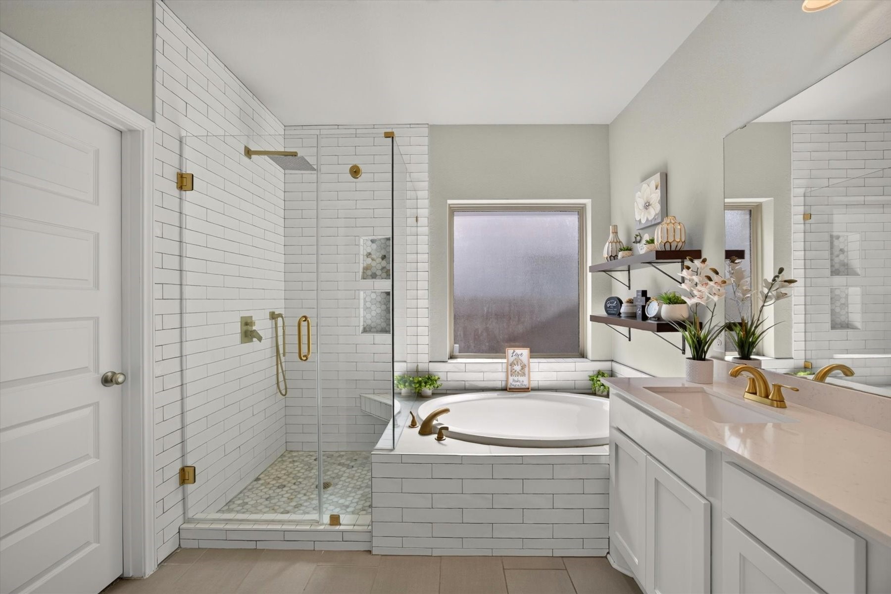 23026 Needle Grass Road Katy, TX 77493 - Photo 20 of 33 Luxurious primary bath designed for relaxation.