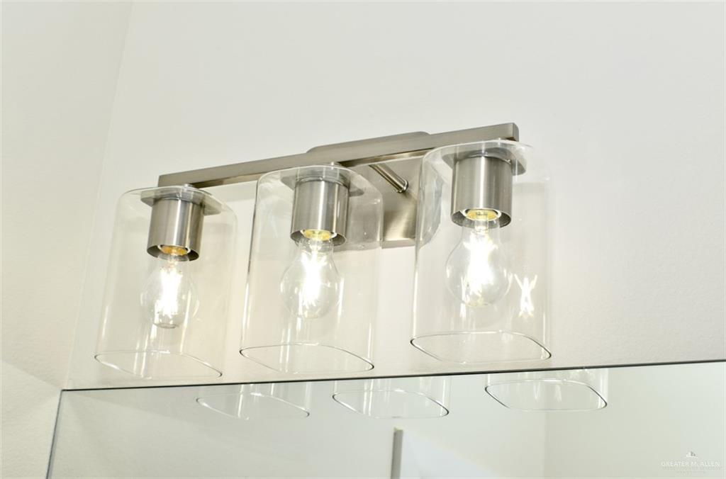 2913 East Israel Avenue Alton, TX 78573 - Photo 16 of 23 a bathroom with a shower