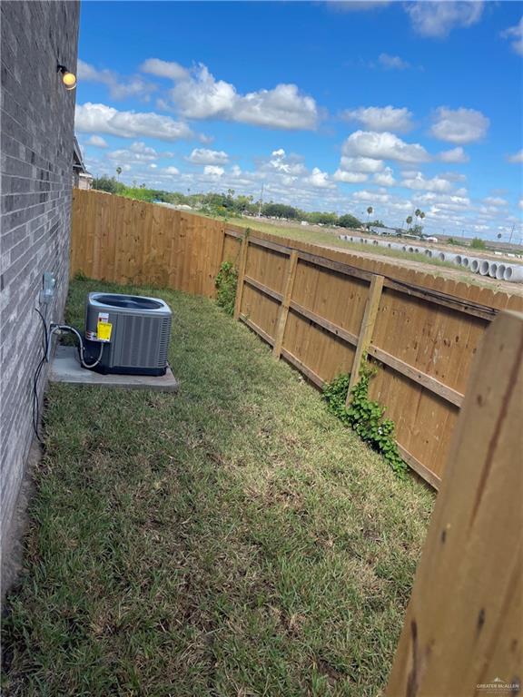 2913 East Israel Avenue Alton, TX 78573 - Photo 20 of 23 a view of a terrace with a yard