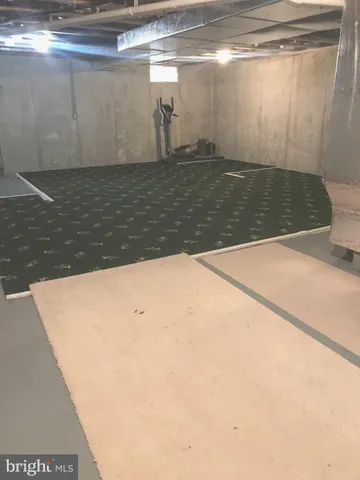 a view of balcony with wooden floor and fence