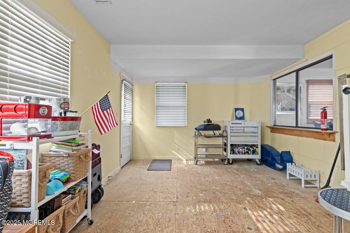 100 3rd Avenue Lavallette, NJ 08735 - Photo 16 of 39 a bedroom with furniture and a window