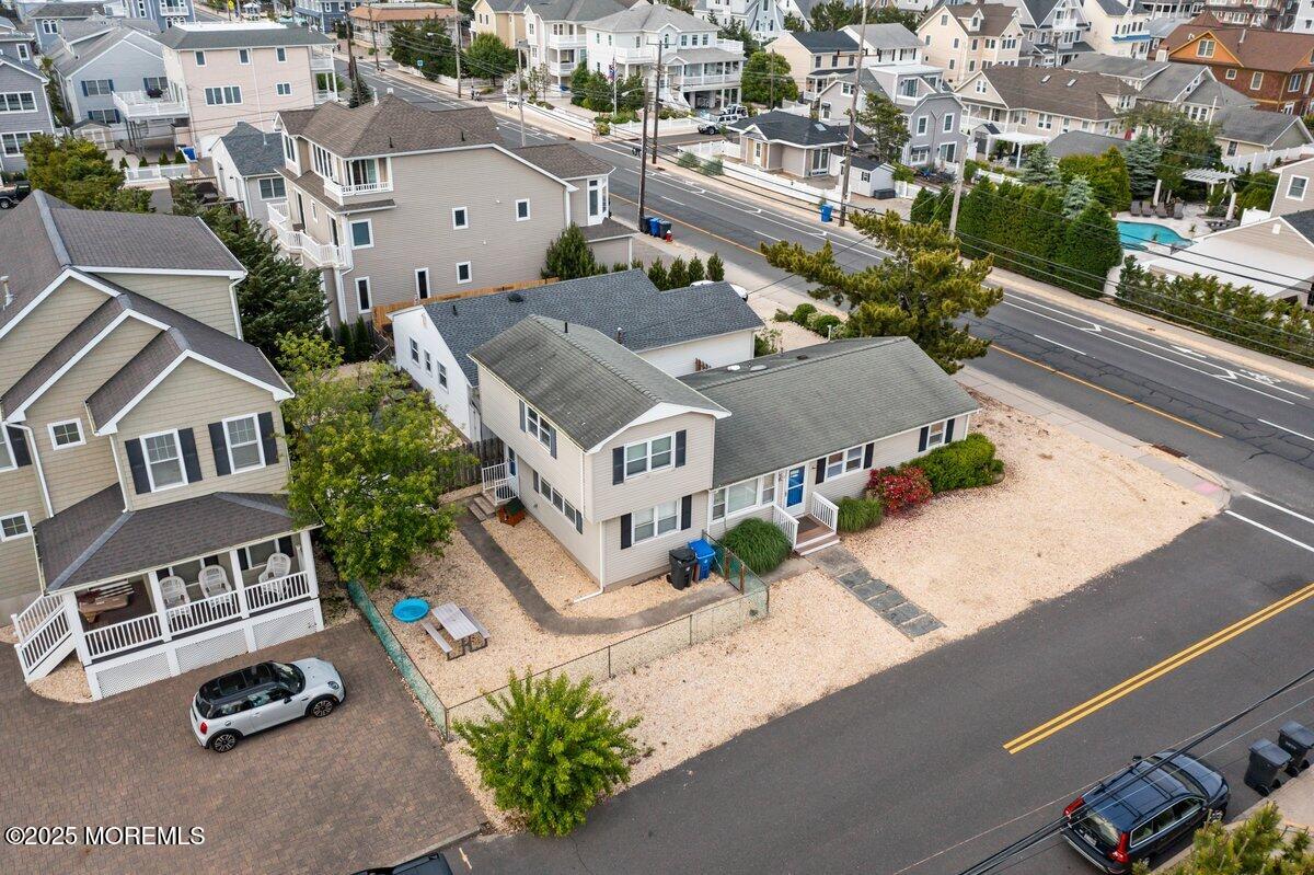 100 3rd Avenue Lavallette, NJ 08735 - Photo 31 of 39 an aerial view of residential houses with outdoor space
