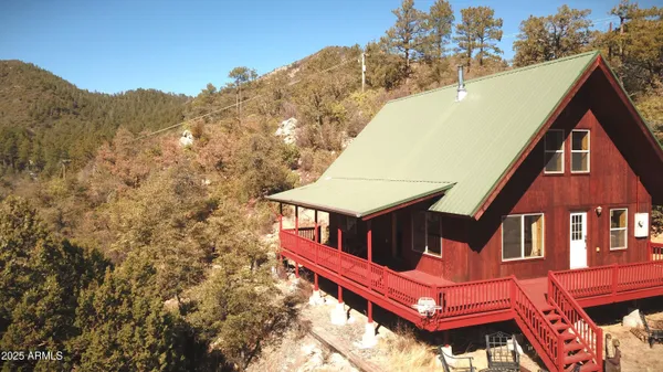 a view of a roof with sitting area