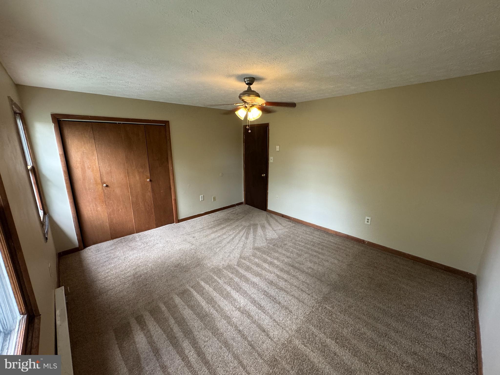 512 Allston Circle Winchester, VA 22601 - Photo 15 of 15 a view of empty room with a chandelier fan