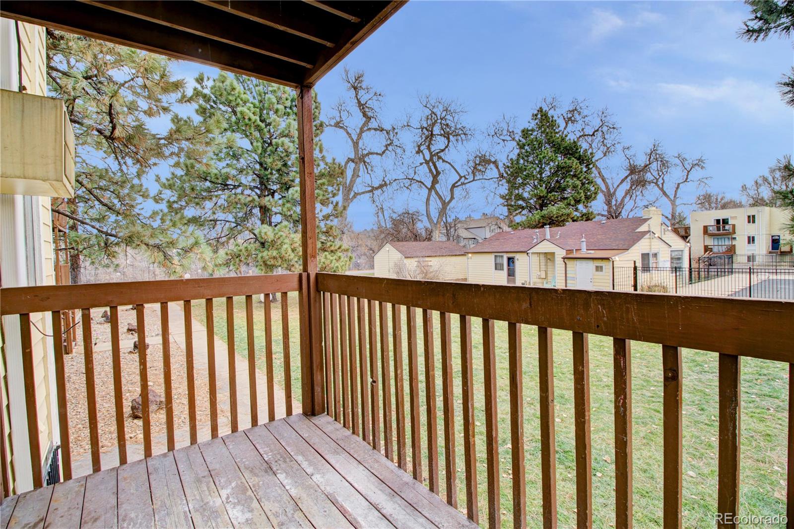 9340 West 49th Avenue, Unit 213 Wheat Ridge, CO 80033 - Photo 7 of 16 a view of a porch