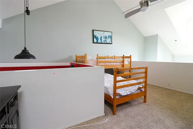 a view of a garden with a lounge chair