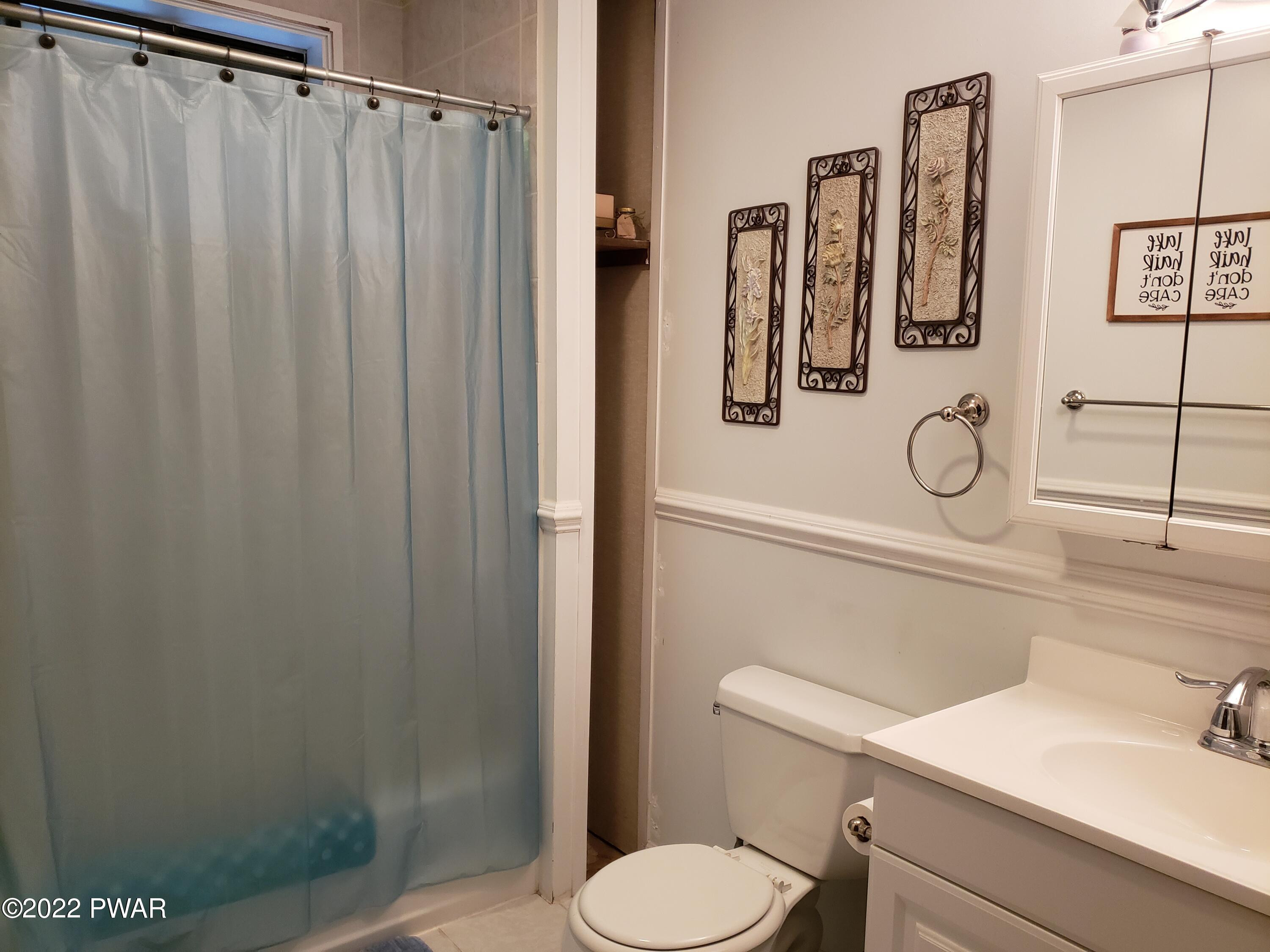 40 Crest View Road Lake Ariel, PA 18436 - Photo 8 of 32 a bathroom with a toilet sink and shower