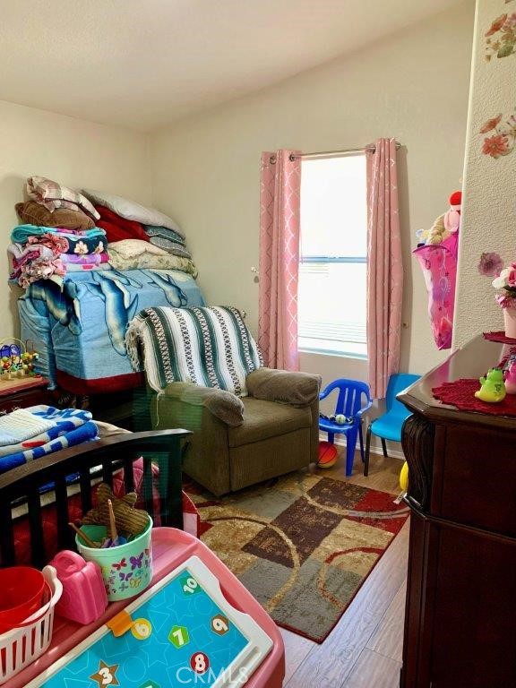 33600 Calimesa Boulevard, Unit 141 Yucaipa, CA 92399 - Photo 17 of 23 a living room with lots of furniture and a rug