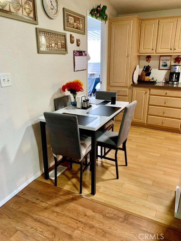 33600 Calimesa Boulevard, Unit 141 Yucaipa, CA 92399 - Photo 6 of 23 a view of a dining room with furniture