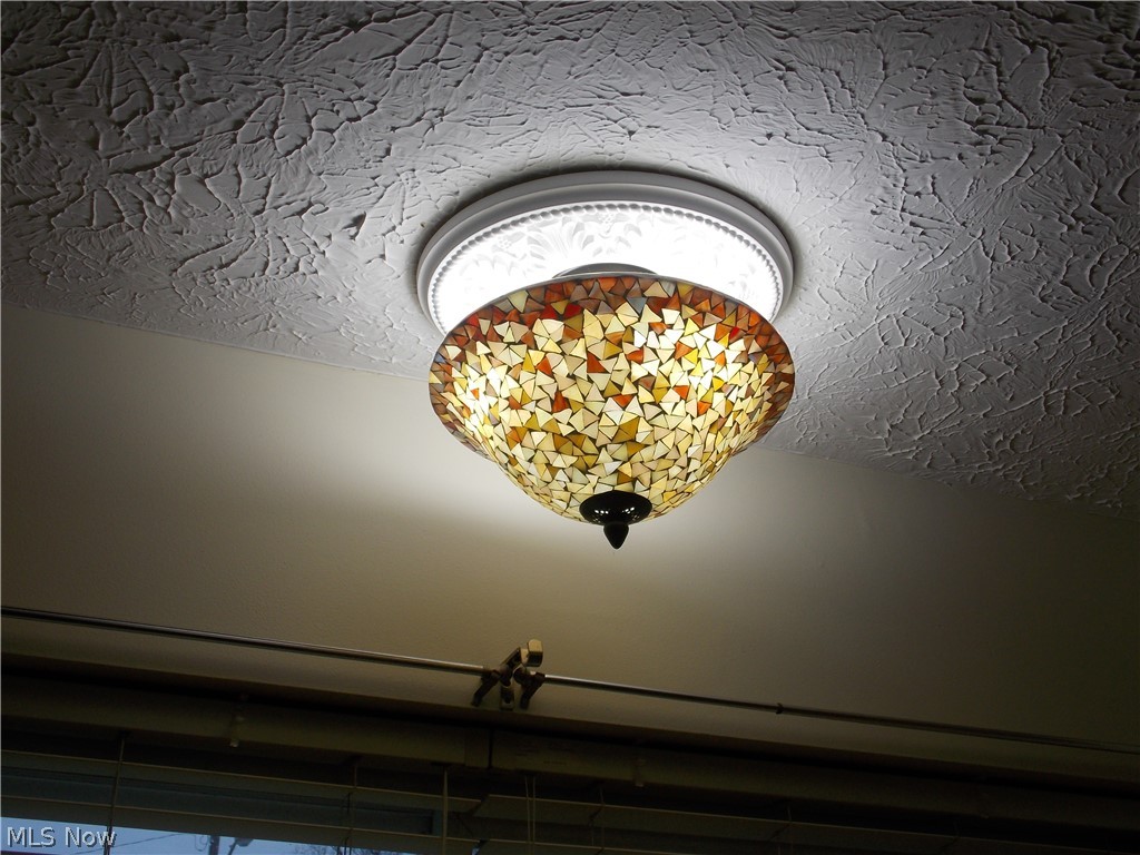 6299 South Canterbury Road Parma, OH 44129 - Photo 9 of 26 This charming light fixture above the sink STAYS!