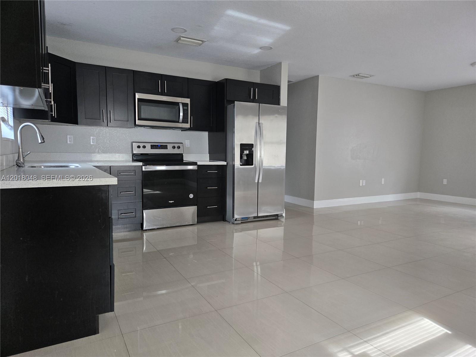 1707 Northwest 68th Terrace, Unit 1 Miami, FL 33147 - Photo 2 of 15