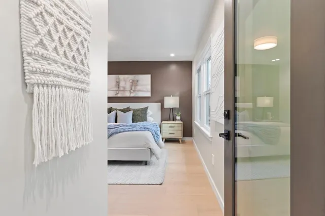a en suite bathroom with a sink and a mirror