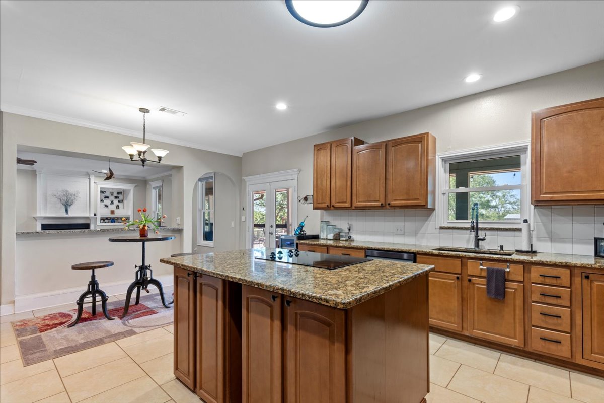 550 League Line Road Smithville, TX 78957 - Photo 16 of 40 a kitchen with a sink and cabinets