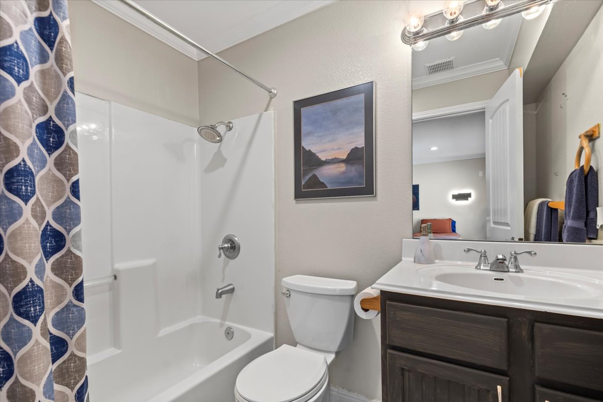 550 League Line Road Smithville, TX 78957 - Photo 29 of 40 a bathroom with a sink toilet and shower