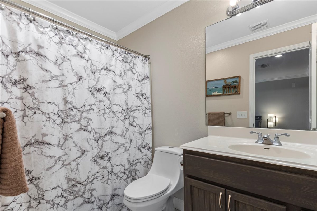 550 League Line Road Smithville, TX 78957 - Photo 31 of 40 a bathroom with a sink toilet and shower