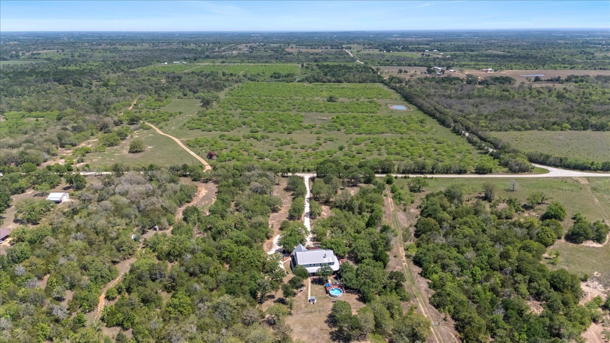 550 League Line Road Smithville, TX 78957 - Photo 40 of 40 a view of a city with lush green forest