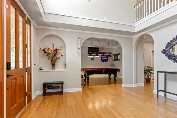 a view of livingroom with furniture workspace and window