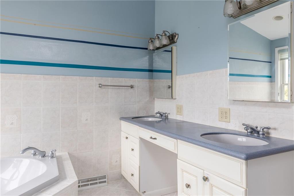 292 Blaker Ridge Road Waynesburg, PA 15370 - Photo 12 of 25 a bathroom with a sink and a vanity