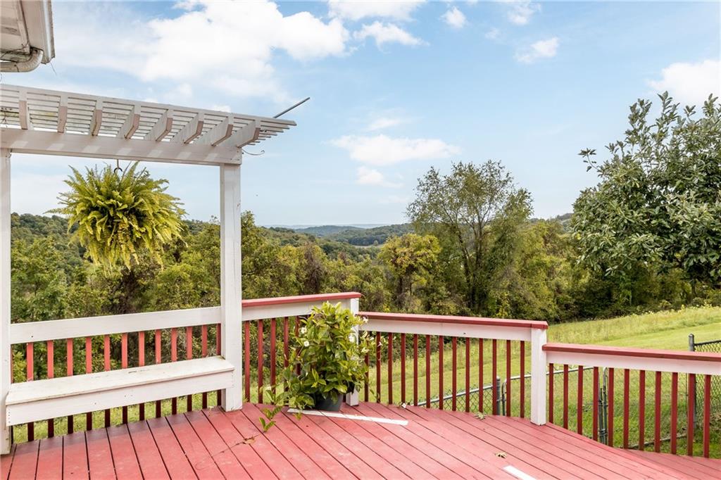 292 Blaker Ridge Road Waynesburg, PA 15370 - Photo 21 of 25 a view of a wooden roof deck
