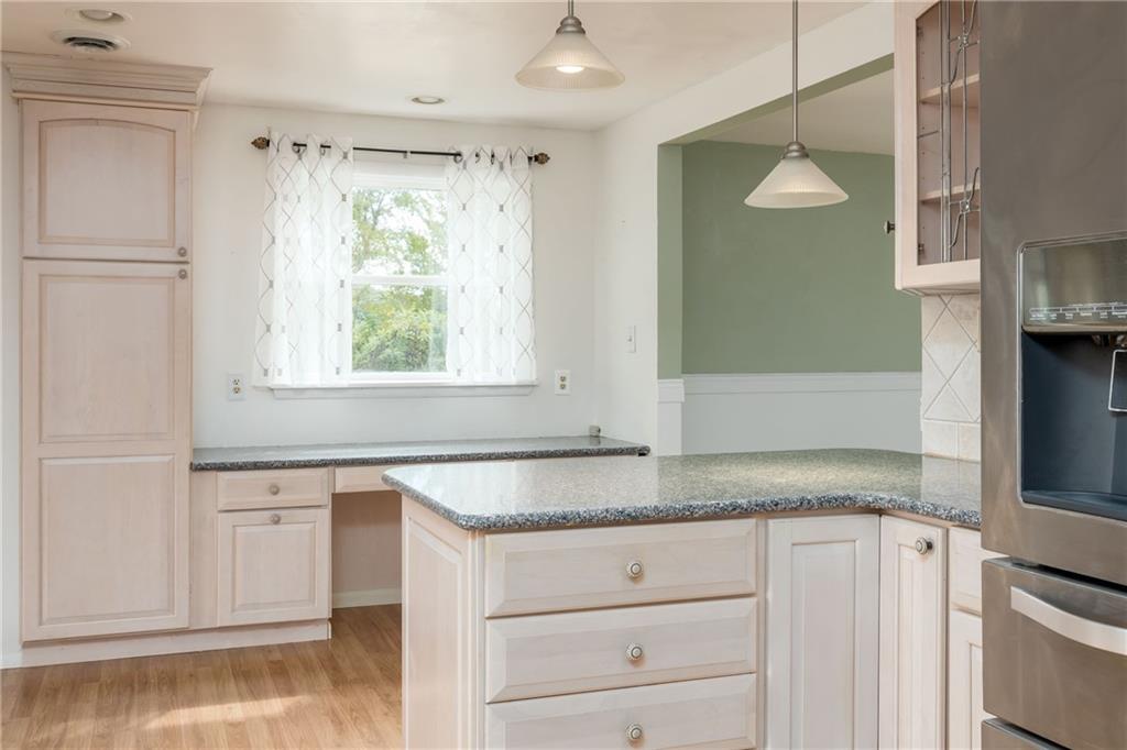 292 Blaker Ridge Road Waynesburg, PA 15370 - Photo 6 of 25 a kitchen with granite countertop white cabinets and a sink