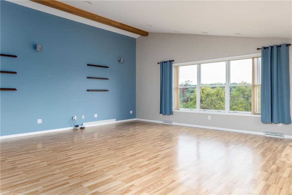 292 Blaker Ridge Road Waynesburg, PA 15370 - Photo 7 of 25 a view of an empty room with wooden floor and a window