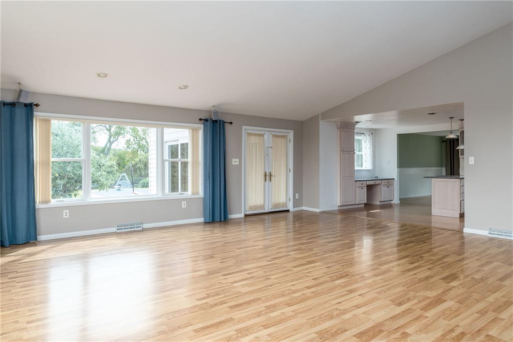 292 Blaker Ridge Road Waynesburg, PA 15370 - Photo 8 of 25 a view of empty room with wooden floor and windows