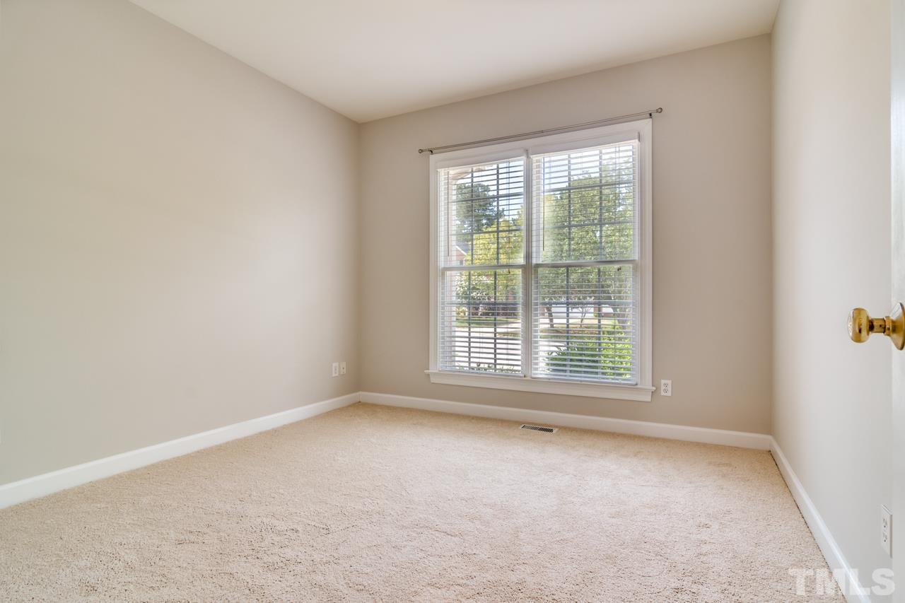 8208 Manatee Court Raleigh, NC 27616 - Photo 12 of 30 an empty room with a window