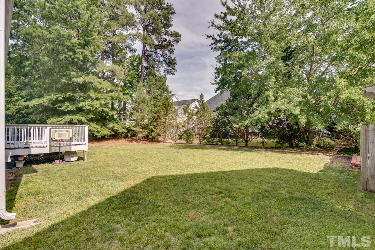 8208 Manatee Court Raleigh, NC 27616 - Photo 24 of 30 a view of yard and lake view